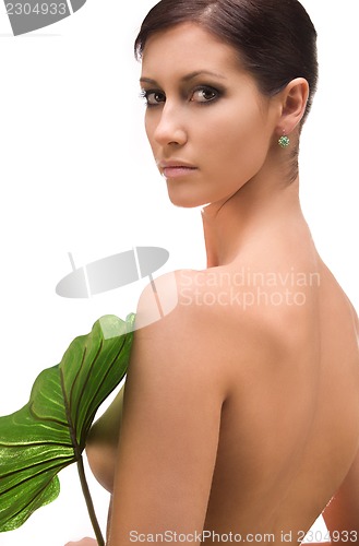Image of woman with green leaf