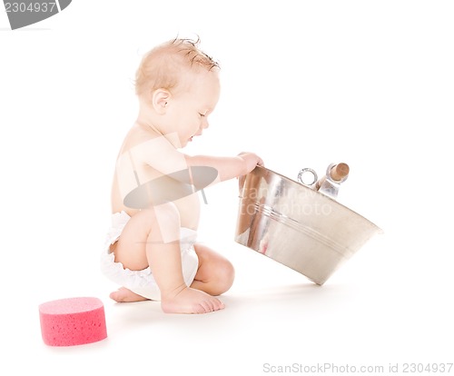 Image of baby boy with wash-tub