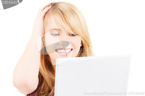 Image of teenage girl with laptop computer
