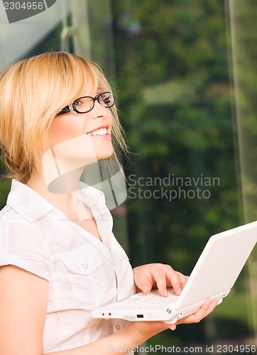 Image of office girl with laptop computer