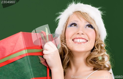 Image of happy santa helper with gift box