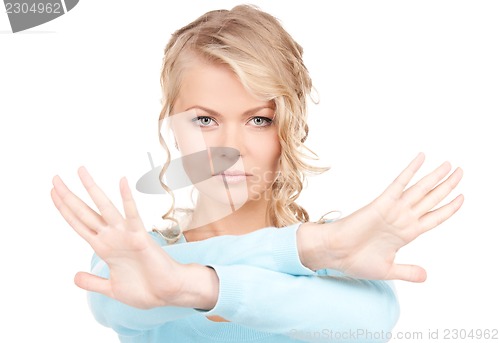 Image of woman making stop gesture