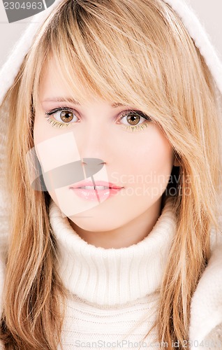 Image of lovely teenage girl in hoodie