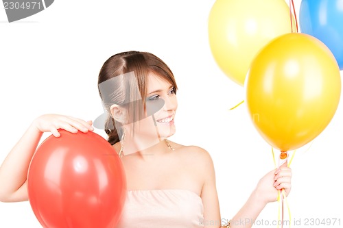 Image of happy teenage girl with balloons