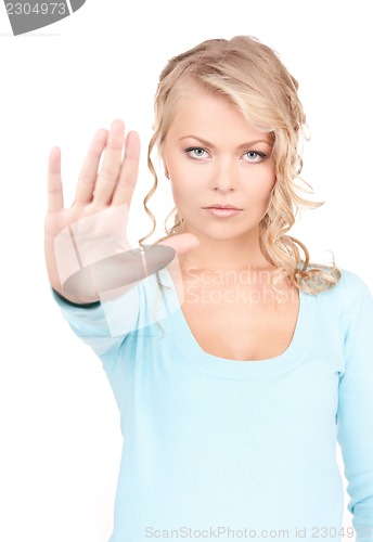 Image of woman making stop gesture