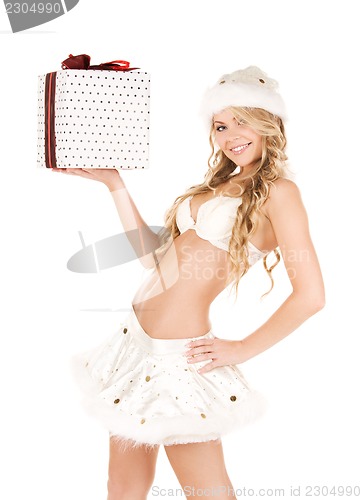 Image of cheerful santa helper girl with gift box