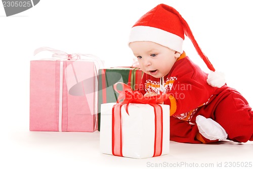 Image of santa helper baby with christmas gifts