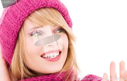 Image of happy teenage girl in hat