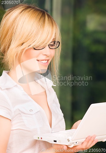 Image of office girl with laptop computer