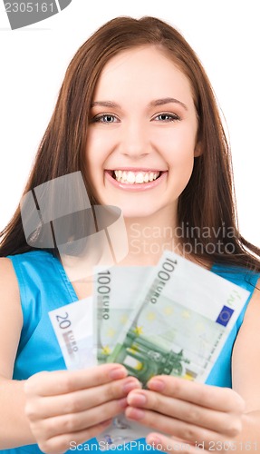 Image of lovely teenage girl with money