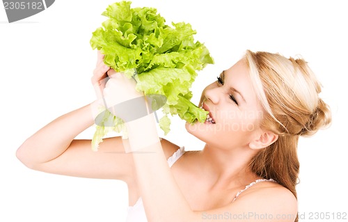 Image of happy woman with lettuce