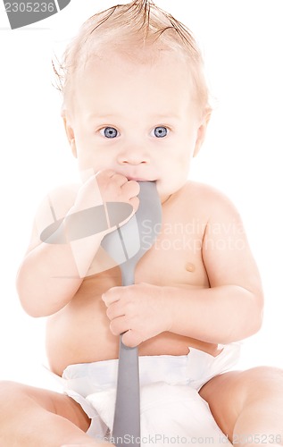 Image of baby boy with big spoon