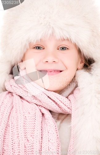 Image of happy girl in winter hat