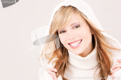 Image of lovely teenage girl in hoodie