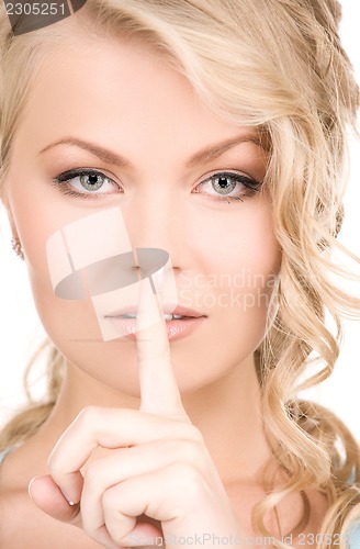 Image of finger on lips