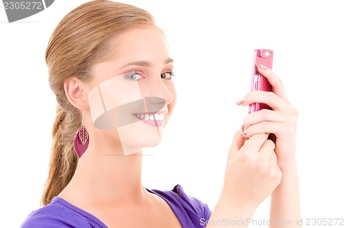 Image of happy teenage girl with cell phone