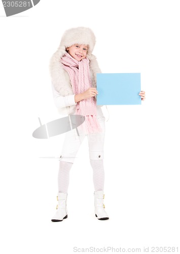 Image of girl in winter hat with blank board