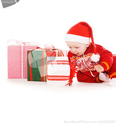 Image of santa helper baby with christmas gifts