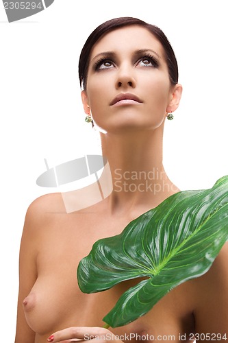 Image of woman with green leaf
