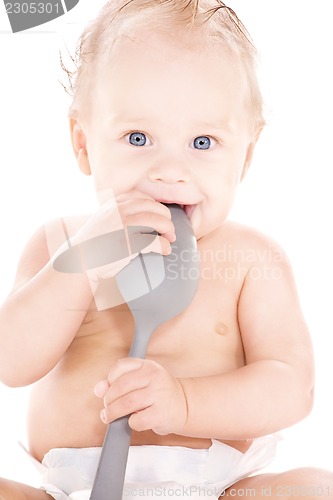 Image of baby boy with big spoon