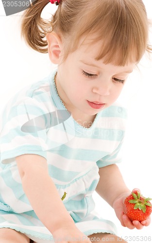 Image of little girl with strawberry