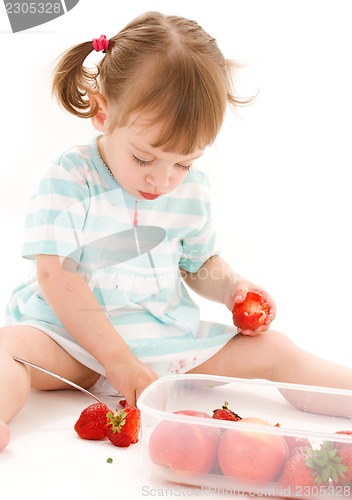 Image of little girl with strawberry