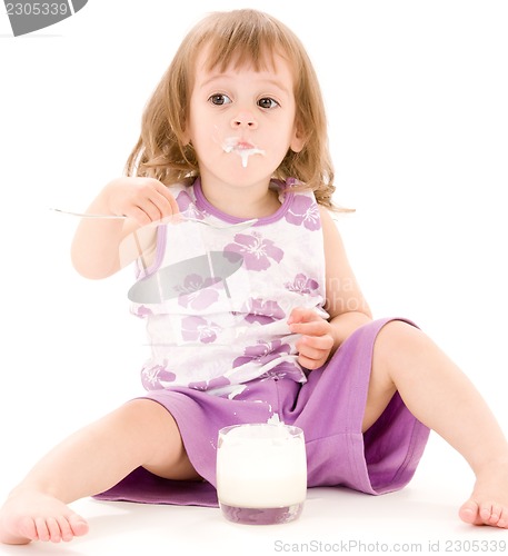 Image of little girl with yogurt