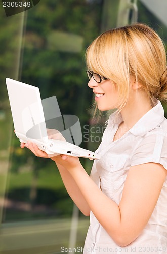 Image of office girl with laptop computer