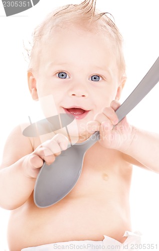 Image of baby boy with big spoon