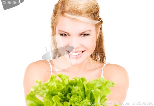 Image of happy woman with lettuce