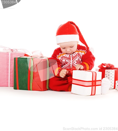 Image of santa helper baby with christmas gifts