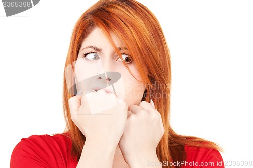 Image of unhappy redhead woman