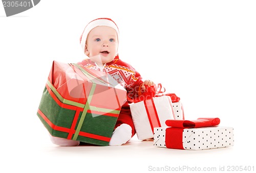 Image of santa helper baby with christmas gifts