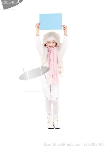 Image of girl in winter hat with blank board