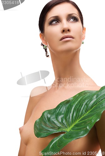 Image of woman with green leaf