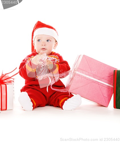 Image of santa helper baby with christmas gifts