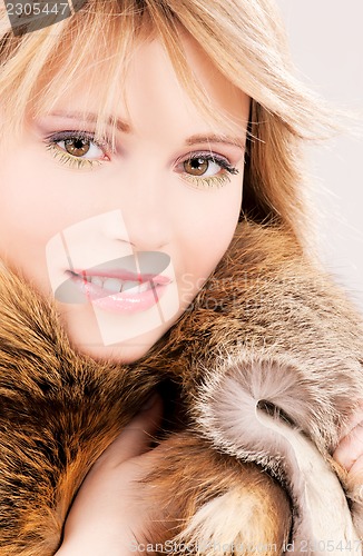 Image of lovely teenage girl in fur
