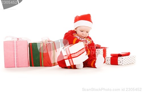 Image of santa helper baby with christmas gifts