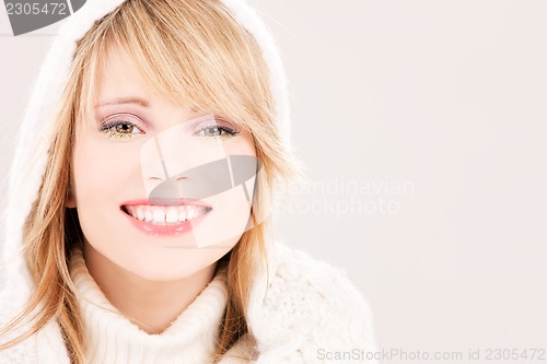 Image of lovely teenage girl in hoodie