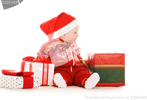 Image of santa helper baby with christmas gifts