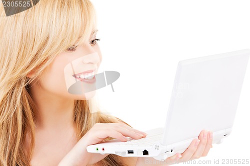 Image of teenage girl with laptop computer
