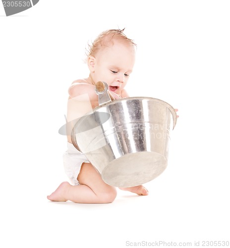 Image of baby boy with wash-tub