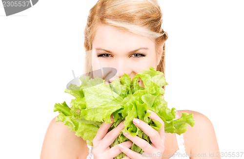 Image of happy woman with lettuce
