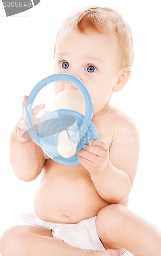 Image of baby boy with big pacifier