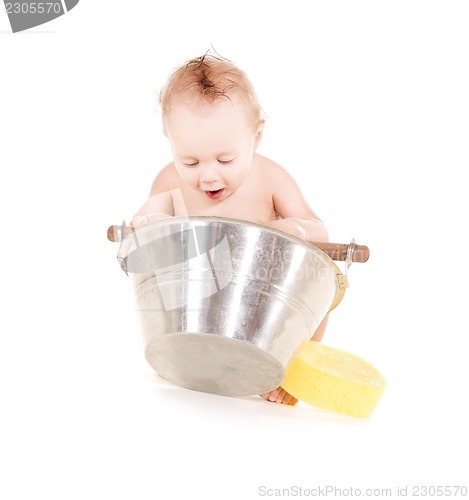 Image of baby boy with wash-tub