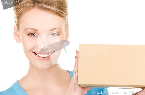 Image of businesswoman with parcel