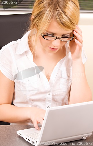 Image of office girl with laptop computer