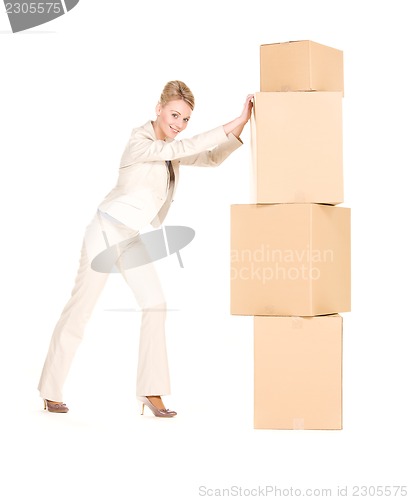 Image of businesswoman with boxes