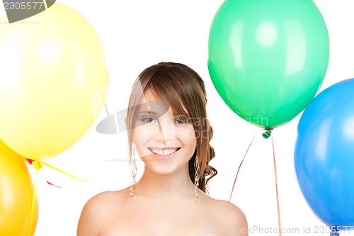 Image of happy teenage girl with balloons