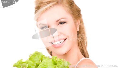 Image of happy woman with lettuce